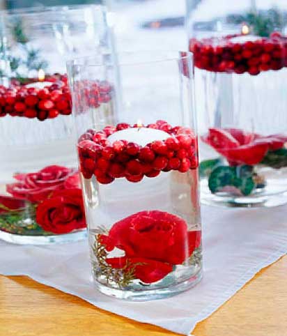 velas-flotantes-en-jarrones-redondos-con-rosas
