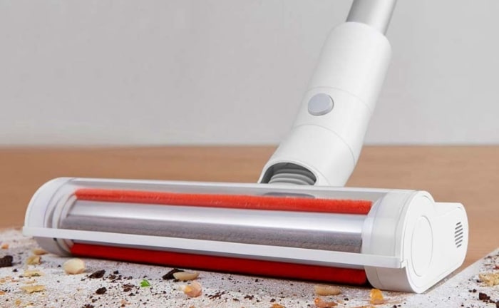 iaomi Handheld Vacuum Cleaner Light aspirando alfombra
