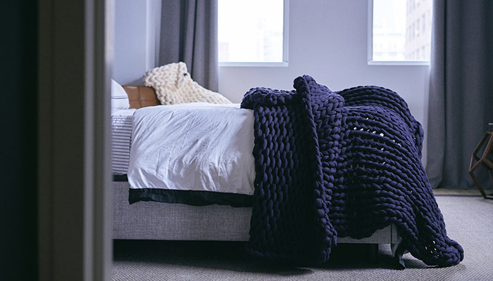 cama con diferentes textiles