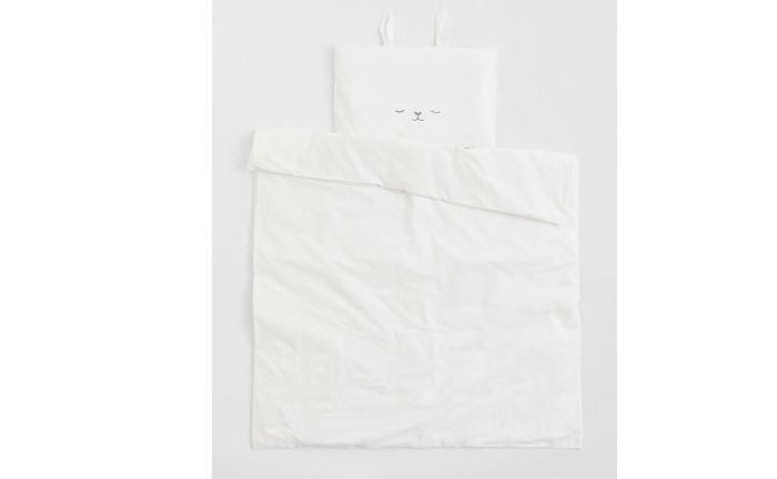 Conjunto de fundas nórdicas para cuna de H&M Home de algodón orgánico en blanco con cara de conejito