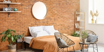 dormitorio con pared de ladrillo