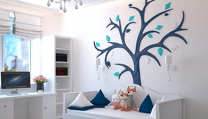 Dormitorio decorado con mural en forma de árbol